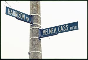 Boston circa 1989: Street sign, Harrison Ave., Melnea Cass Blvd.