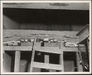 Construction of Boylston Building, Boston Public Library, close up of concrete, shims and a ladder
