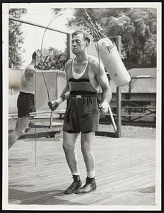 Sharkey Winds Up Training - Jack Sharkey, former heavyweight champion, wound up his training here today for his bout with Joe Louis by skipping rope. He meets the Brown Bomber at Yankee Stadium, New York City, tomorrow night.