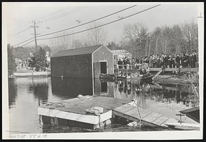 Quiet But Deadly was this scene at Morey's Dam as workers and spectators waited for threat to ease.