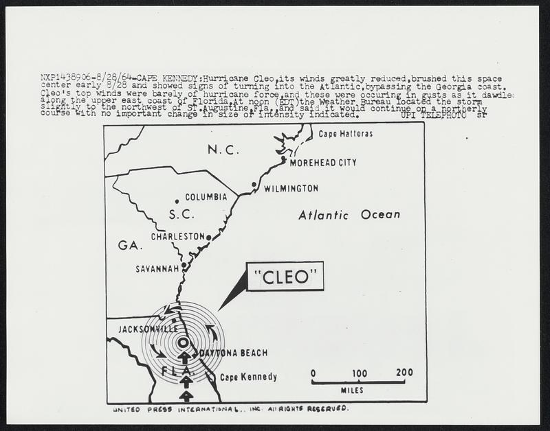 Hurricane Cleo, its winds greatly reduced, brushed this space center early 8/28 and showed signs of turning into the Atlantic, bypassing the Georgia coast. Cleo's top winds were barely of hurricane force, and these were occurring in guts as it dawled along the upper east coast of Florida. At noon (EDT) the Weather Bureau located the storm slightly to the northwest of St. Augustine, Fla., and said it would continue on a northerly course with no important change in size or intensity indicated.