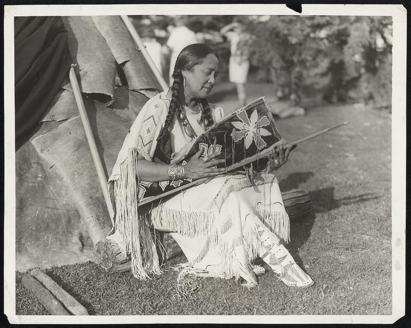 Maine Indians in Ceremonial for First Time. Combining for their first inter-tribal ceremony, braves and their Squaws from the Penobscot and Passamaquoddy tribes of Indians in Maine gathered on one of their ancient hunting grounds on bank of the Penobscot River at Bangor, Maine, and went through ceremonies of centuries ago. Above is shown princess Wavawaso who did an Indian cradle dance.