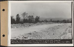 Contract No. 55, Portion of Petersham-New Salem Highway, Petersham, Franklin County (Worcester County?), placing stone, looking northerly from Sta. 378+40, Franklin County, Mass., Sep. 8, 1936