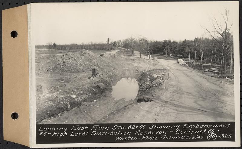 Contract No. 80, High Level Distribution Reservoir, Weston, looking east from Sta. 82+00 showing embankment 4, high level distribution reservoir, Weston, Mass., May 6, 1940