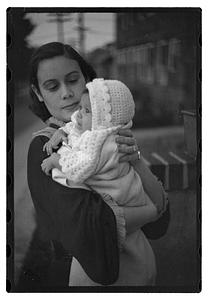 Mercedes Pasarell Sanromá holding a baby