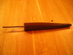 Japanese parasol of conical form, folded