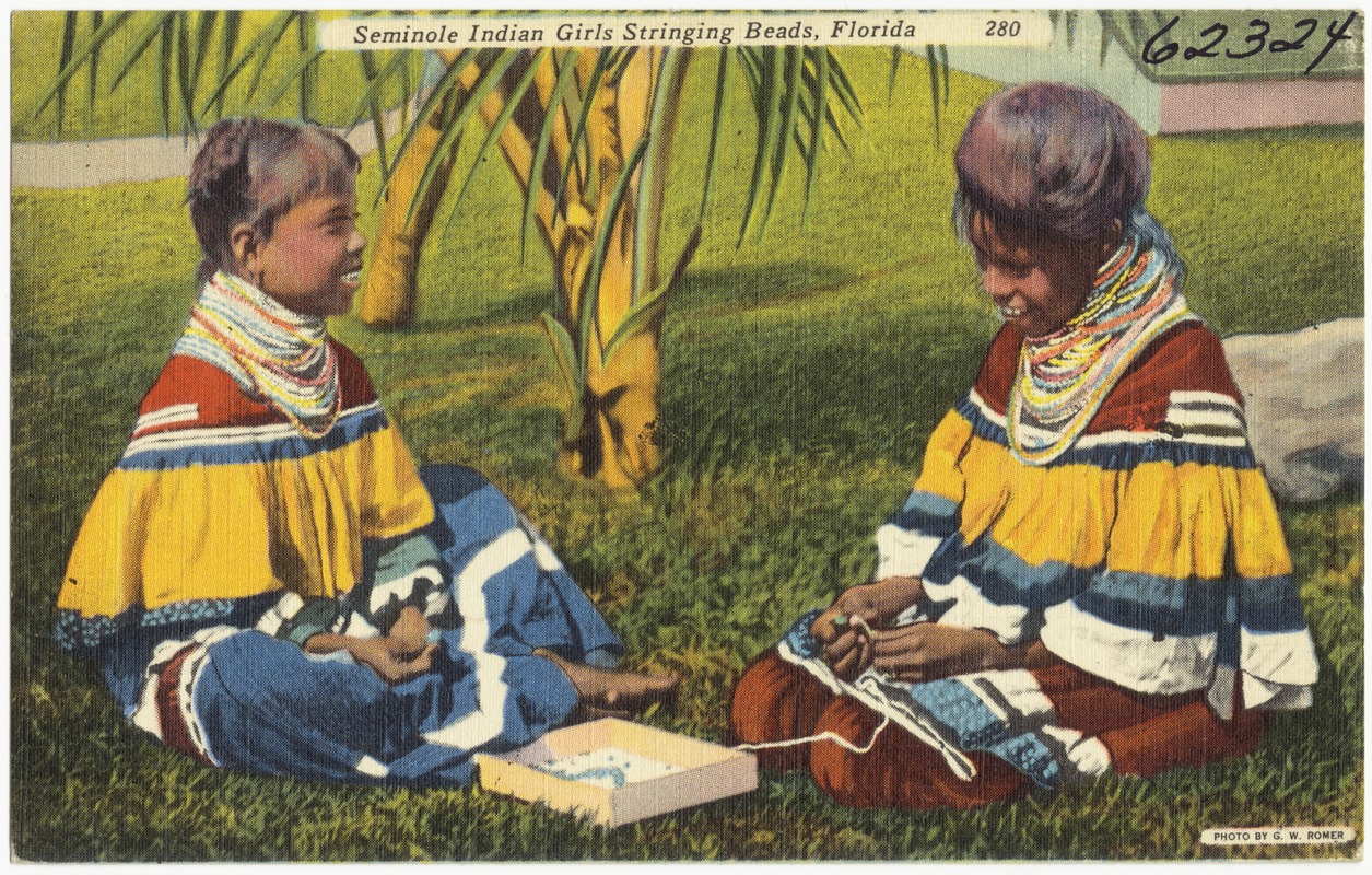 Seminole Indian girls stringing beads, Florida