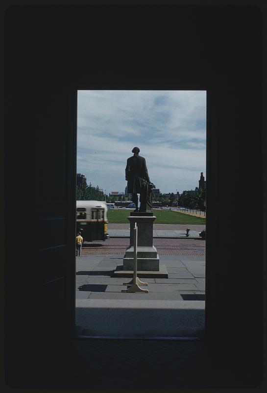 View through doorway of statue