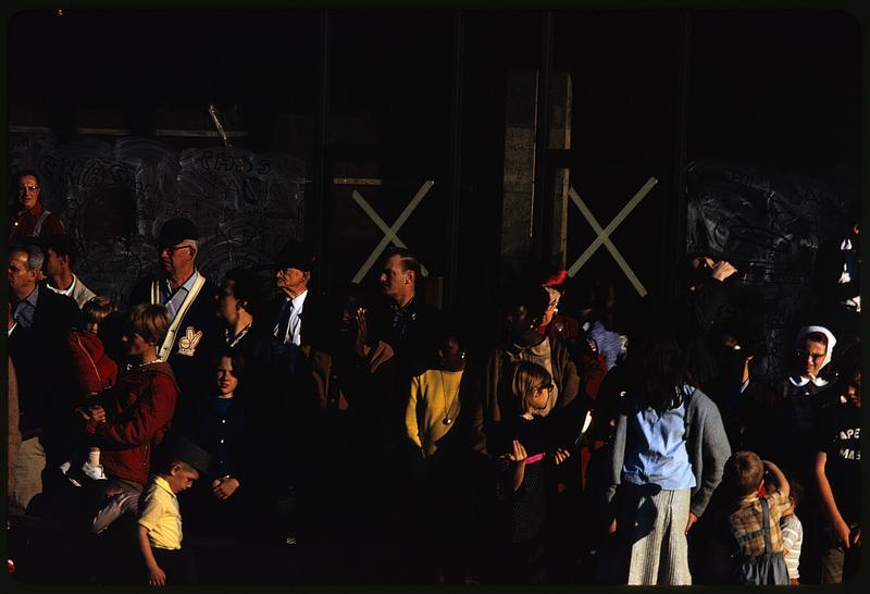 People watching a parade on Tremont Street, Boston