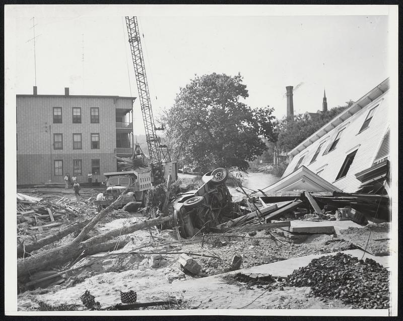 Southbridge Battles Back-Huge crane dumps debris into dump truck in ...