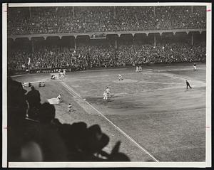 A crowd of 40,000 jammed Brooklyn's Ebbets Field for that city's debut of night baseball on June 15, 1938. Johnny Vander Meer pitched his second consecutive no hitter that evening as the reds won, 6-0.