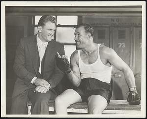 Tolands Gym. Ernie Schaaf getting pointers from Jack Sharkey