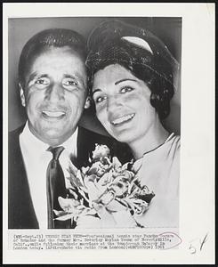 Tennis Star Weds--Professional tennis star Pancho Segura of Ecuador and the former Mrs. Beverly Moylan Young of Beverly Hills, Calif., smile following their marriage at the Ecuadorian Embassy in London today.