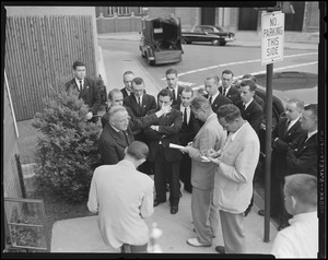 Unidentified group of men on street