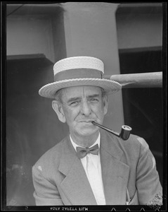 Unidentified man smoking pipe