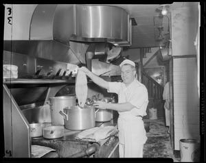 Man cooking fish