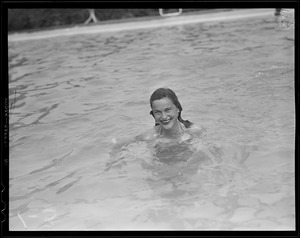 Smiling girl in bathing suit