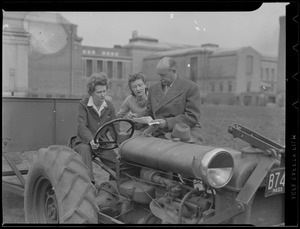 Unidentified people with tractor