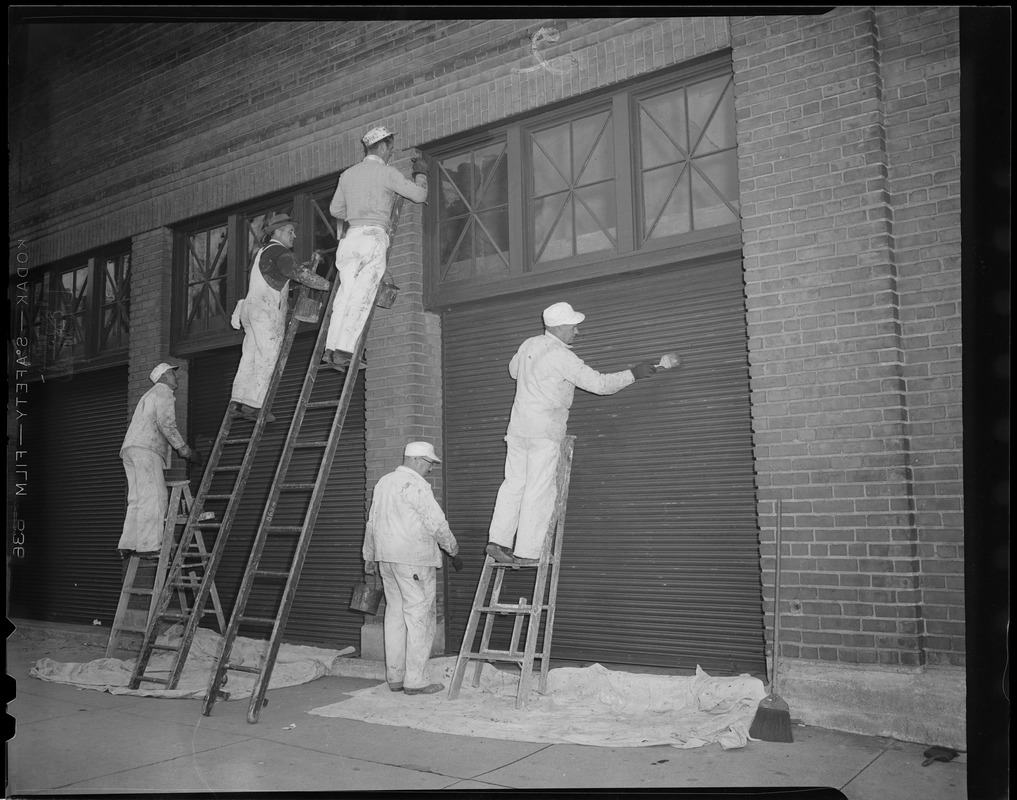 Men painting house