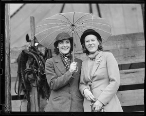Unidentified women with umbrella