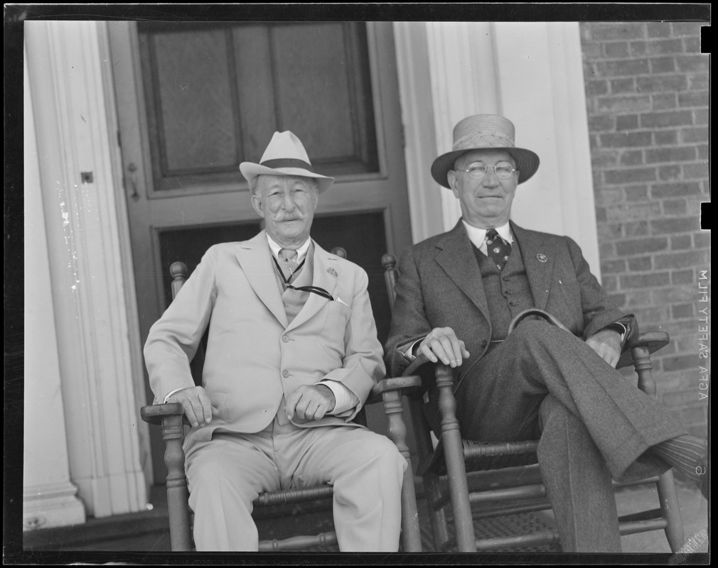 Unidentified men sitting