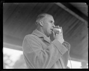 Man speaking into microphone