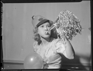Unidentified woman with party horn