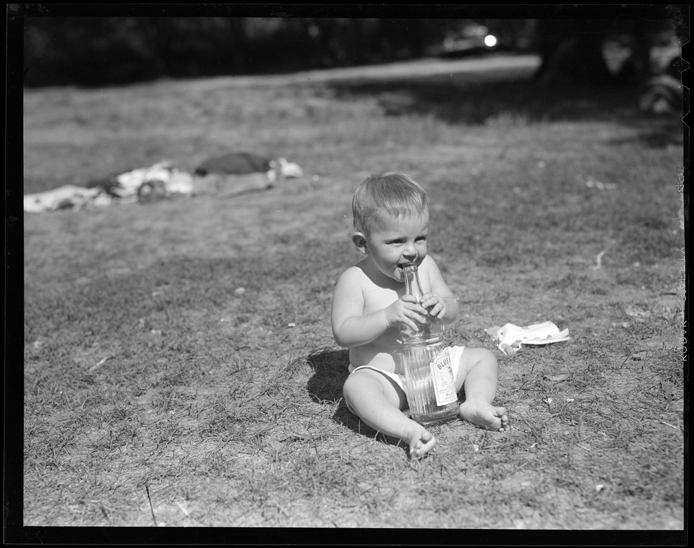 Baby with big bottle