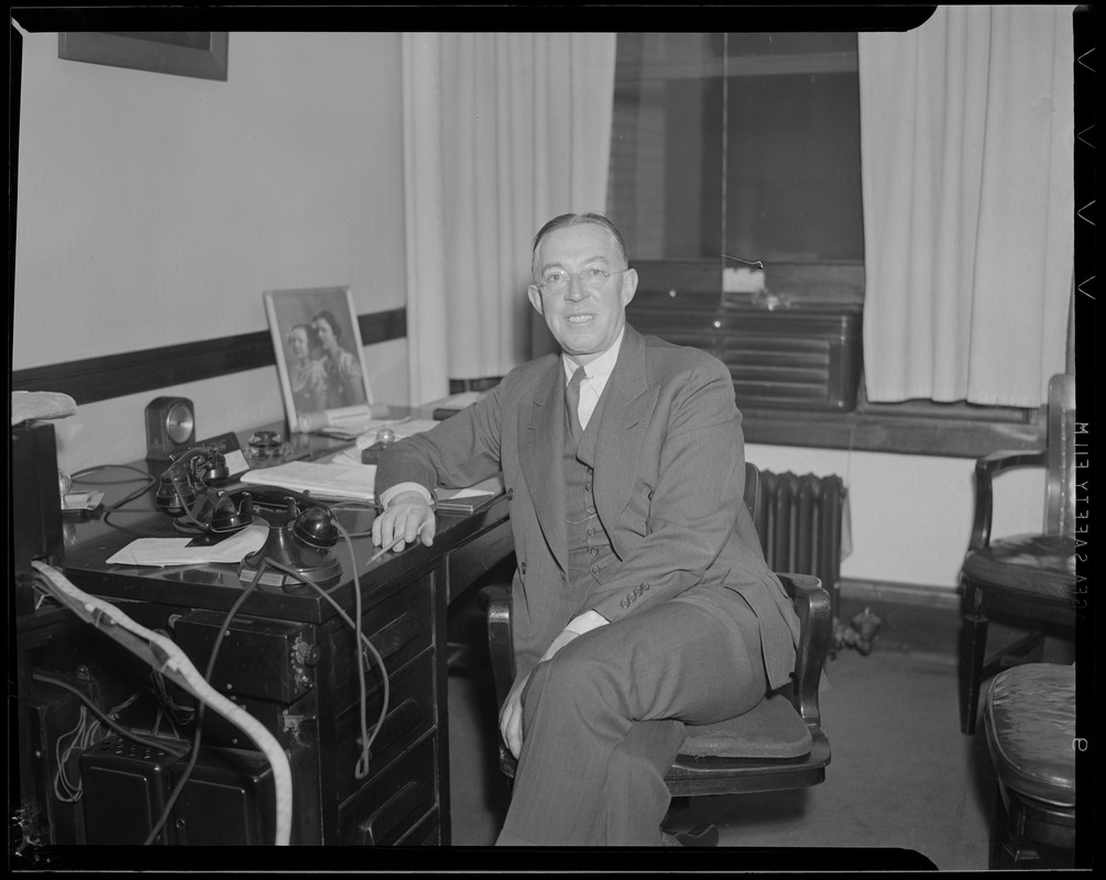 Man in suit at desk