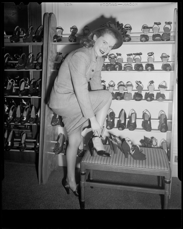 Woman trying on shoes