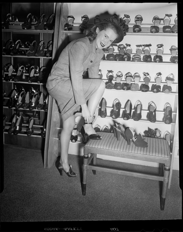 Woman tries on shoes