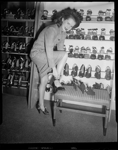 Woman tries on shoes