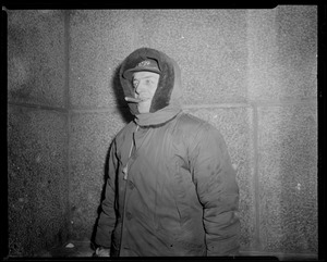 Man in parka with cigar