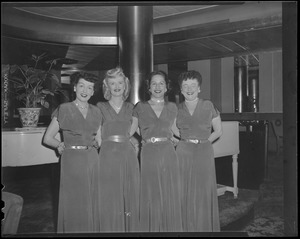 Four ladies in evening dress
