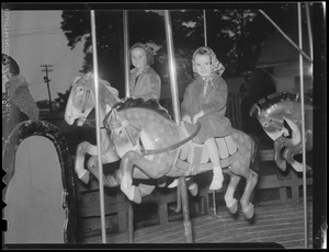 Girls on carousel