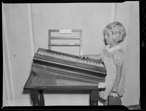 Little girl with keyboard