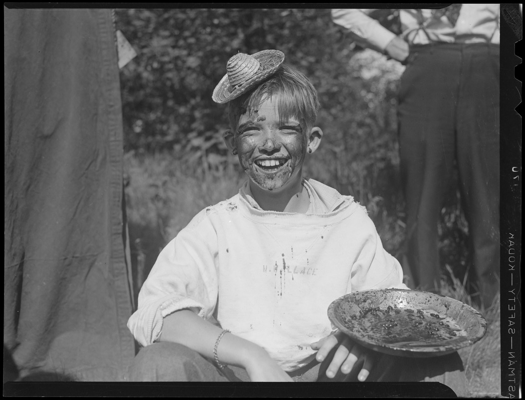 Boy in pie eating contest Digital Commonwealth