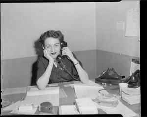 Woman in office, possibly related to Fenway