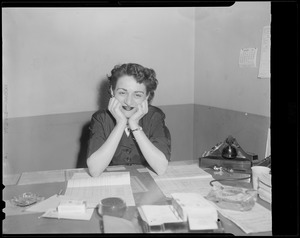 Woman in office, possibly related to Fenway