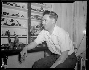 Man with pipe collection