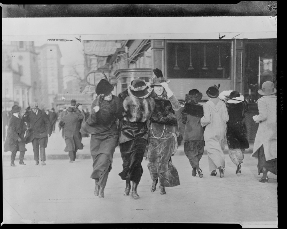 Three women on a windy day