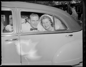 Newlyweds in car