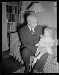 Man poses with granddaughter