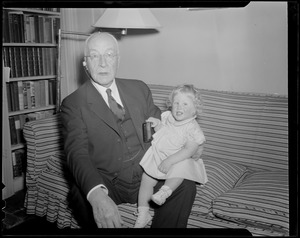 Man poses with granddaughter