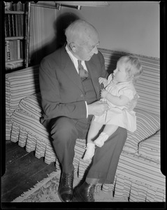 Man poses with granddaughter