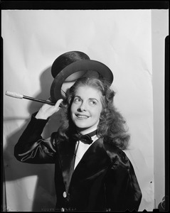 Woman with cane and top hat