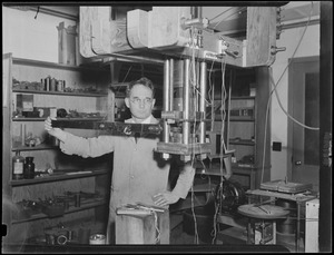 Odd things: Scientist makes miniature earthquake - reproducing the gigantic strains which results in earthquakes within the earth, Prof. P. W. Bridgman of Harvard expects to learn much about their nature.