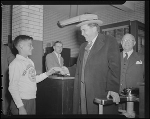 Wendell Willkie greets Boys Club of America member while in Boston to get honorary degree from B.U.