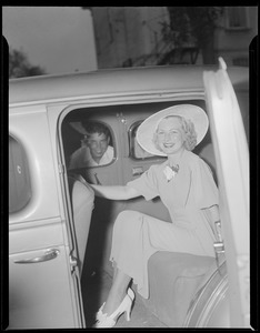 Woman in auto, poss. Anne Clark
