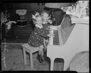 Mayor Tobin's daughters playing the piano